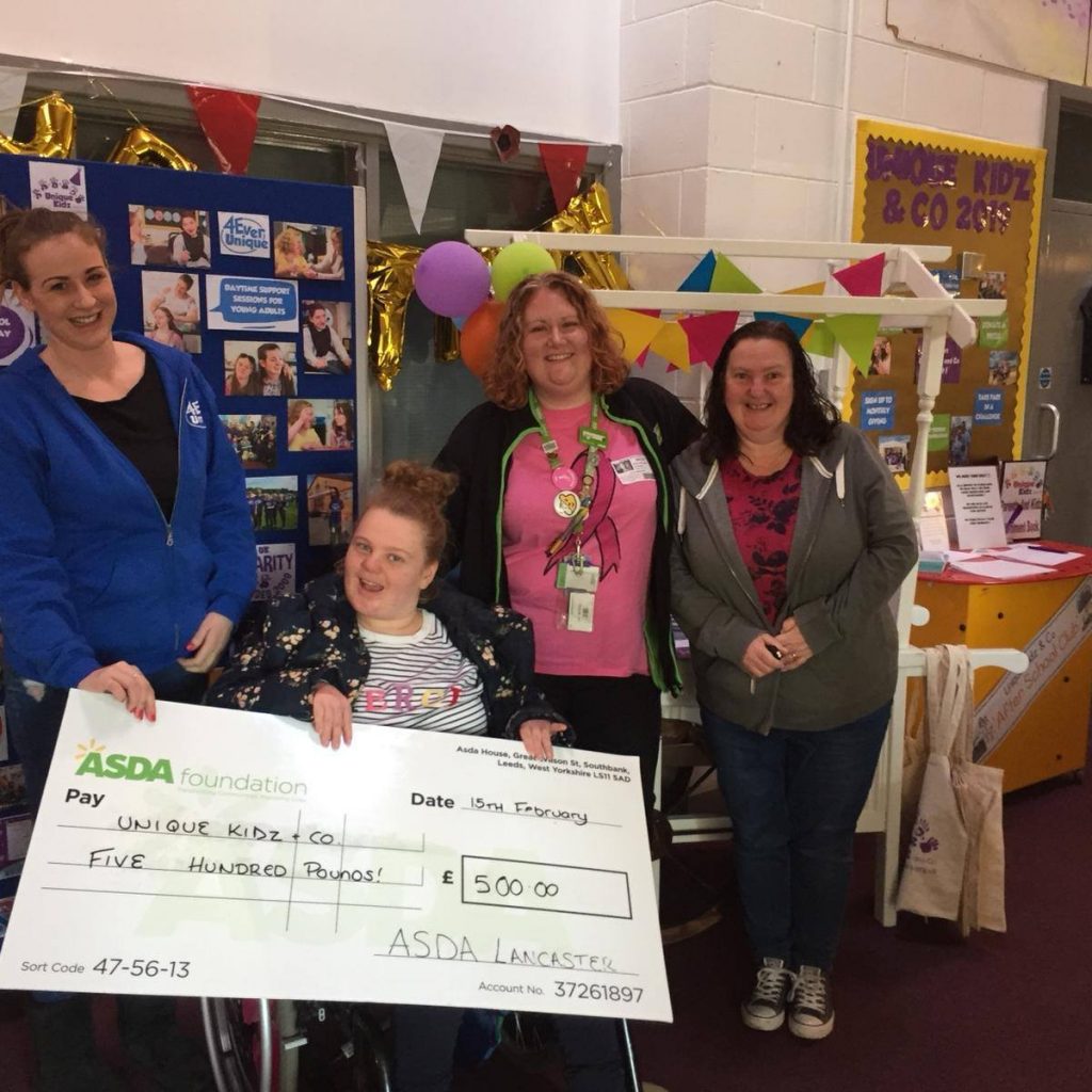 Asda Community Champion Hayley drops off cheque at Unique Kidz and Co for winning the green token giving programme